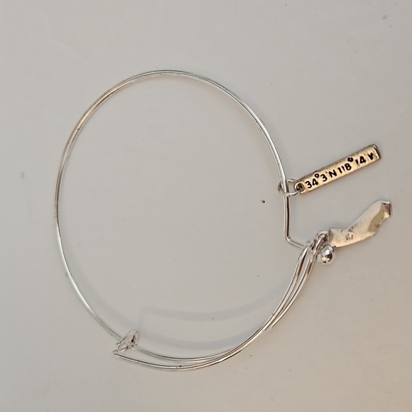 3 Charmed Silvertone Bracelets - Picture 2 of 10